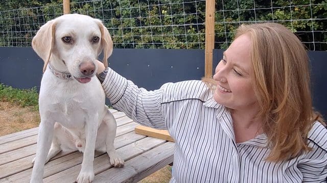 CEO, Joanna, with rescue dog, Cookie